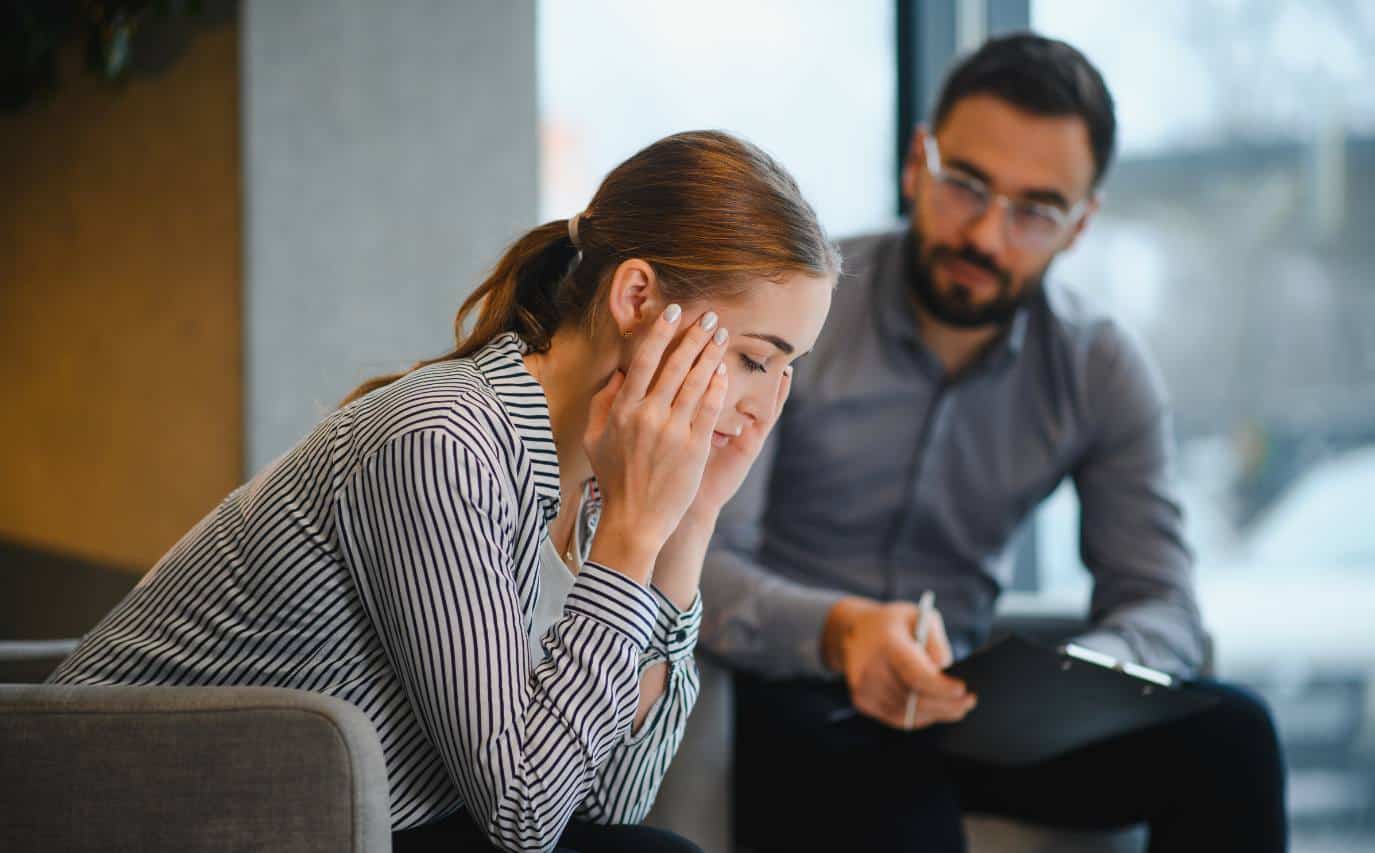 High-functioning anxiety Malaysia — composed professional feeling overwhelmed at her desk